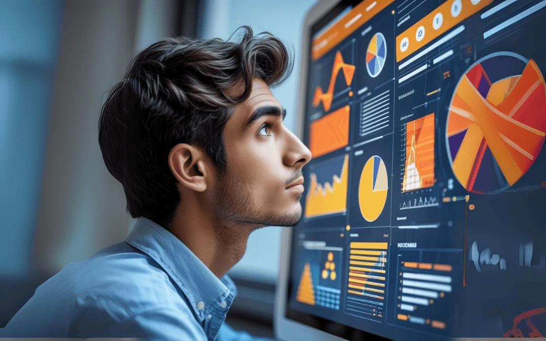 Jovem observando atentamente um monitor com gráficos coloridos, representando o uso de inteligência artificial para análise de dados e visualização de informações.